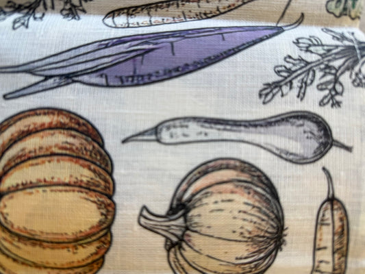 Close-up of the heirloom vegetable print and linen weave
