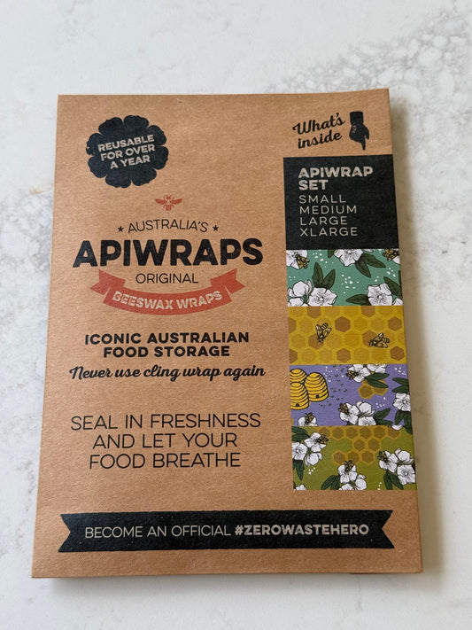 The Apiwrap Set of 4 beeswax wraps in Leatherwood Bee, on our kitchen bench in Bayside