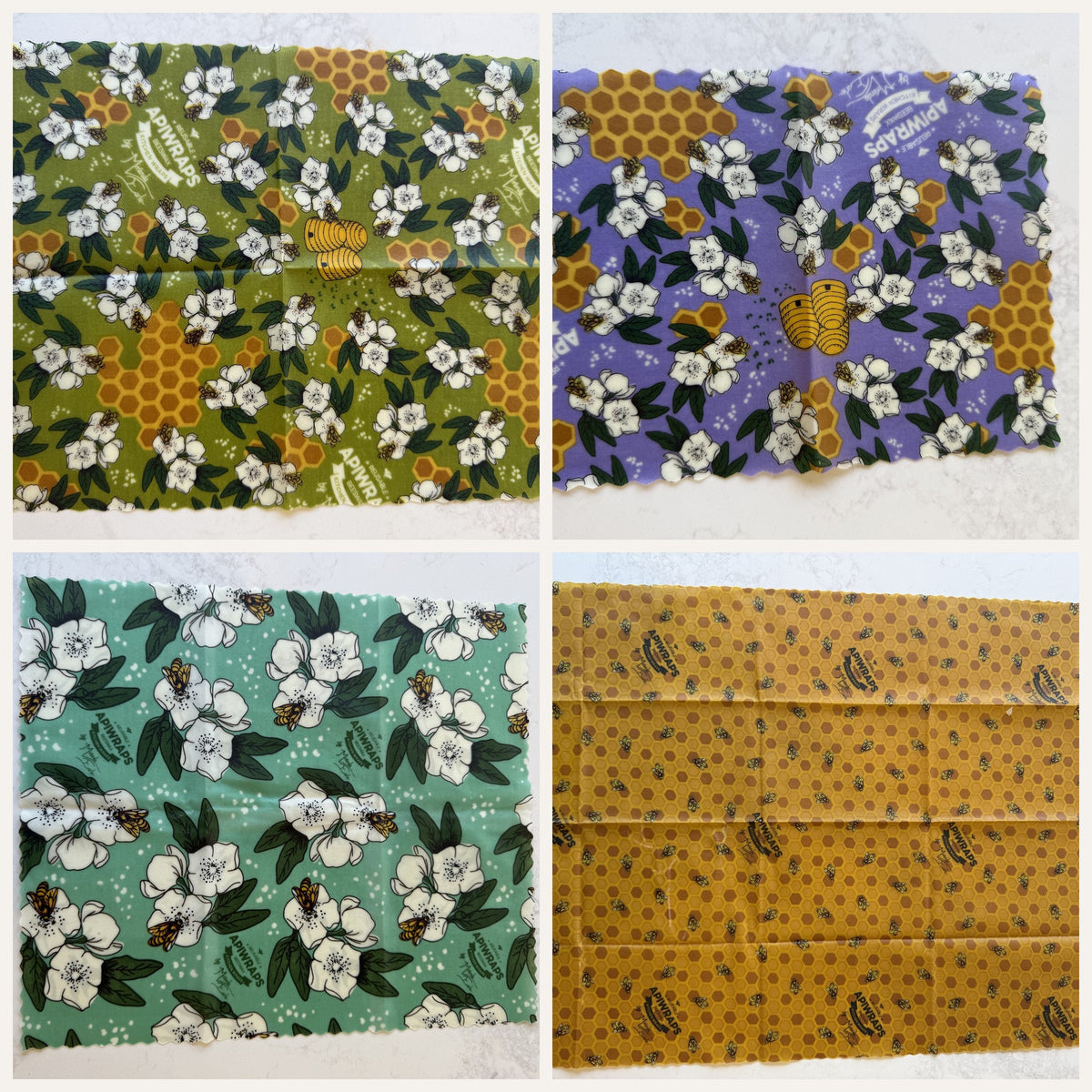 The four wraps in the Apiwrap Set laid flat