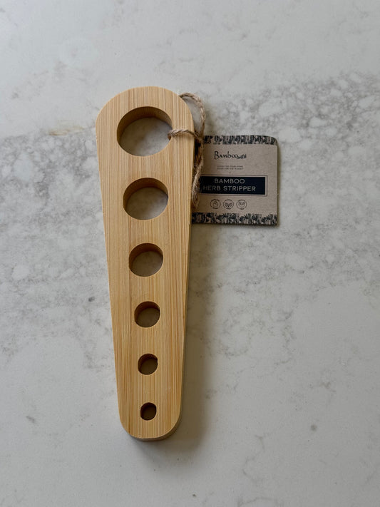 Bamboo herb stripper with six hole sizes, on our kitchen bench in Bayside
