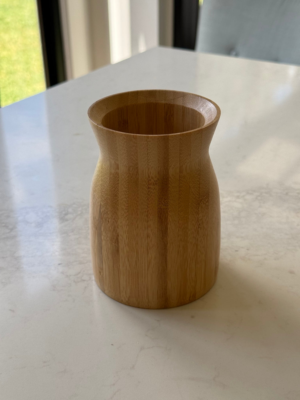 Bamboo utensil holder, on our kitchen bench in Bayside