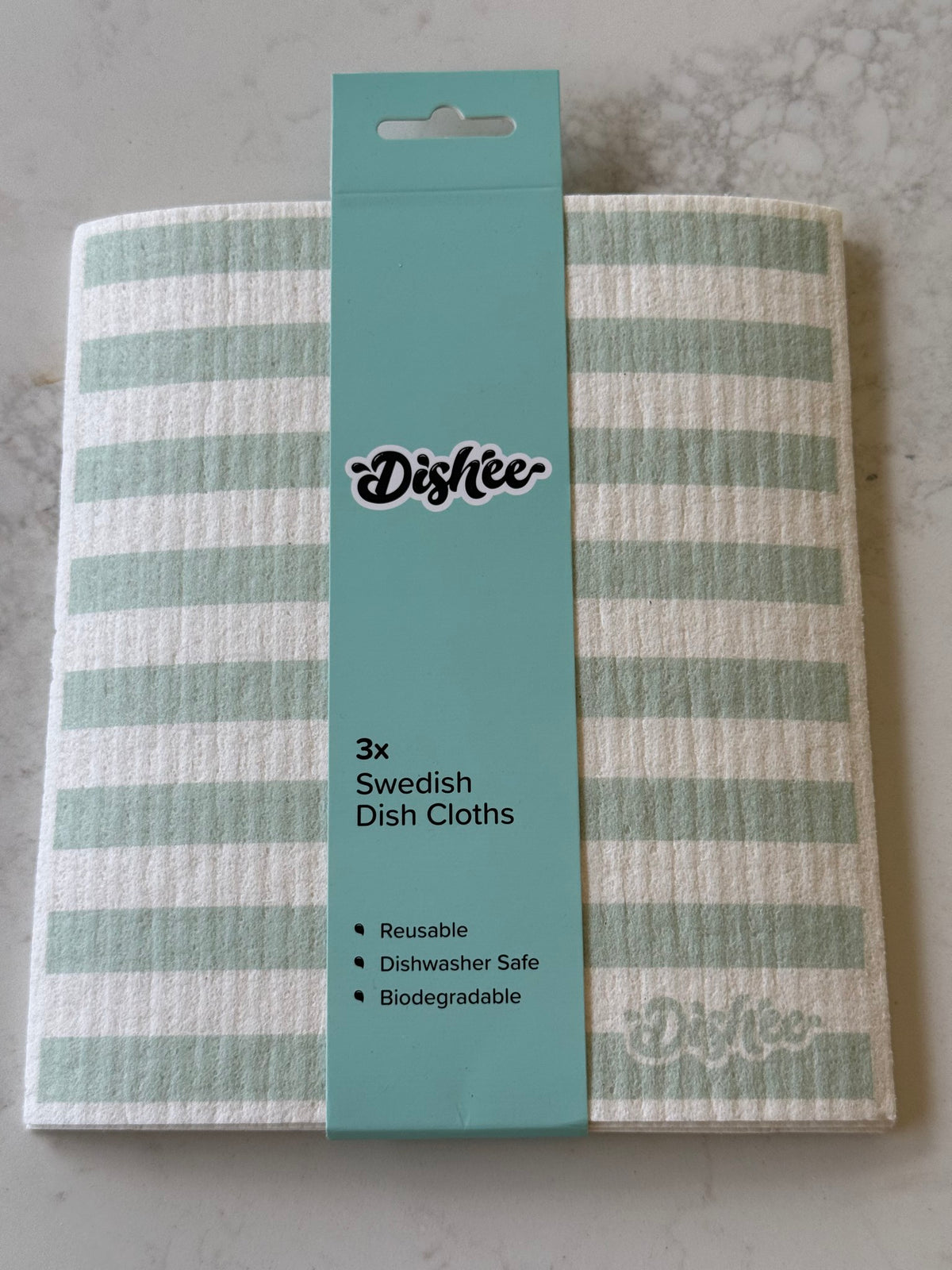 Dishee Swedish dish cloths 3 pack in Sage Stripe, on our kitchen bench in Bayside