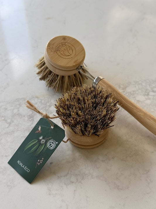 Refill head next to the full dish brush