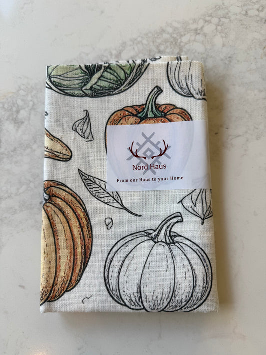 Nord Haus Heirloom Vegetables linen tea towel folded, on our kitchen bench in Bayside